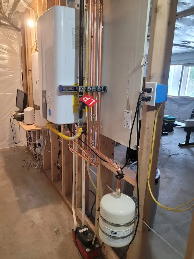 Licensed plumber repairing a kitchen sink in Havre